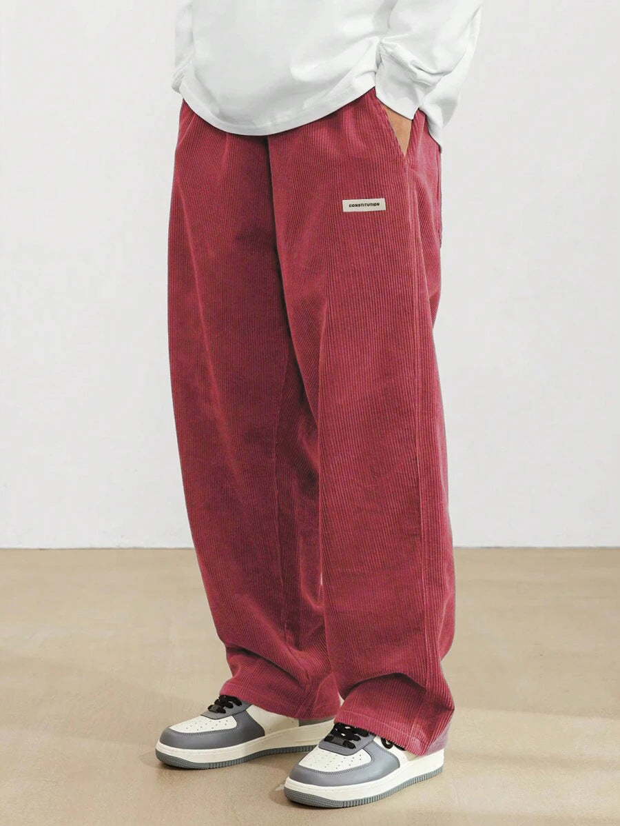 Pantalon homme en velours côtelé coupe baggy taille élastique jambes larges