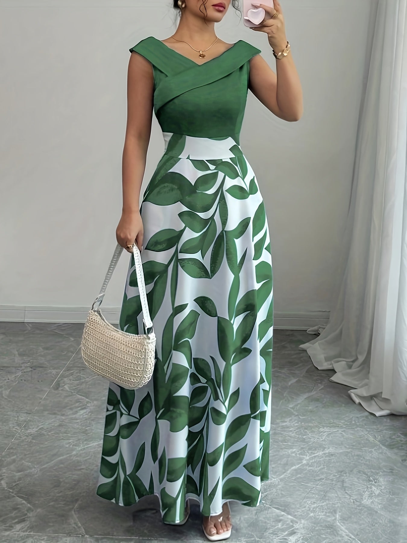 Robe longue invitée mariage imprimé feuillage taille cintrée