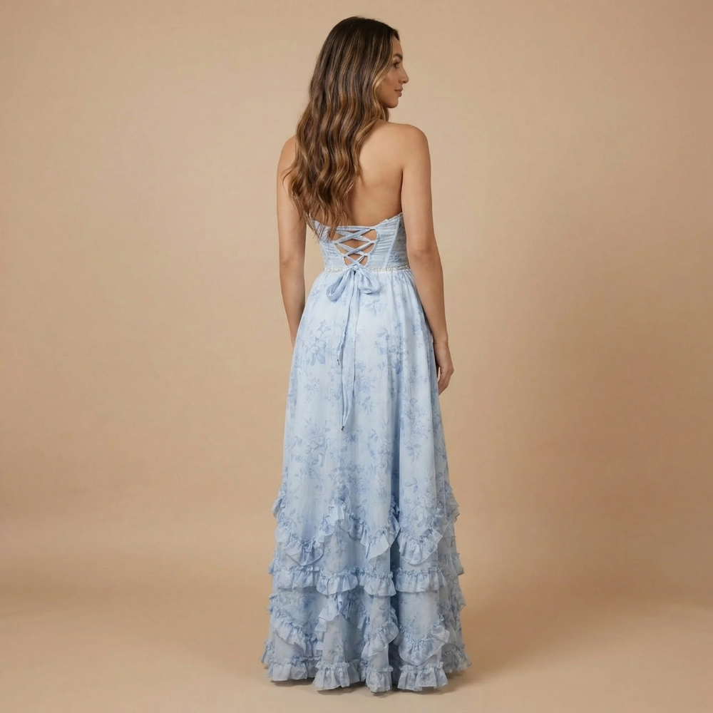 Robe longue invitée mariage dos nu à fleurs avec fente et volants