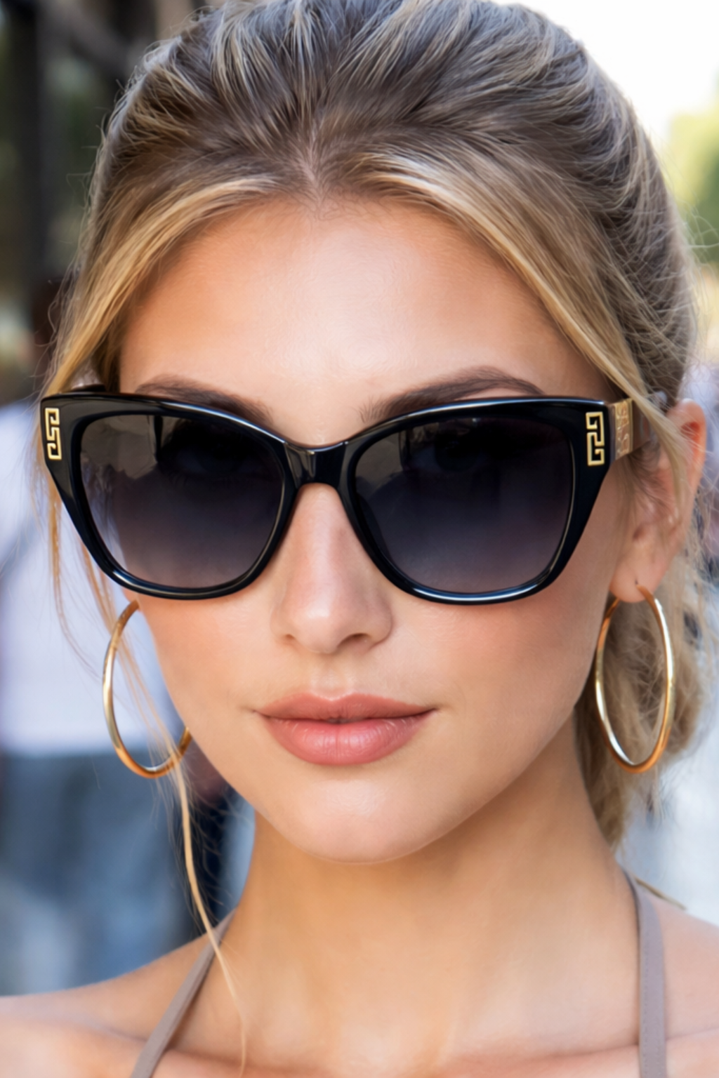 Lunettes de soleil femme œil de chat monture écaille verres dégradés détails dorés UV400