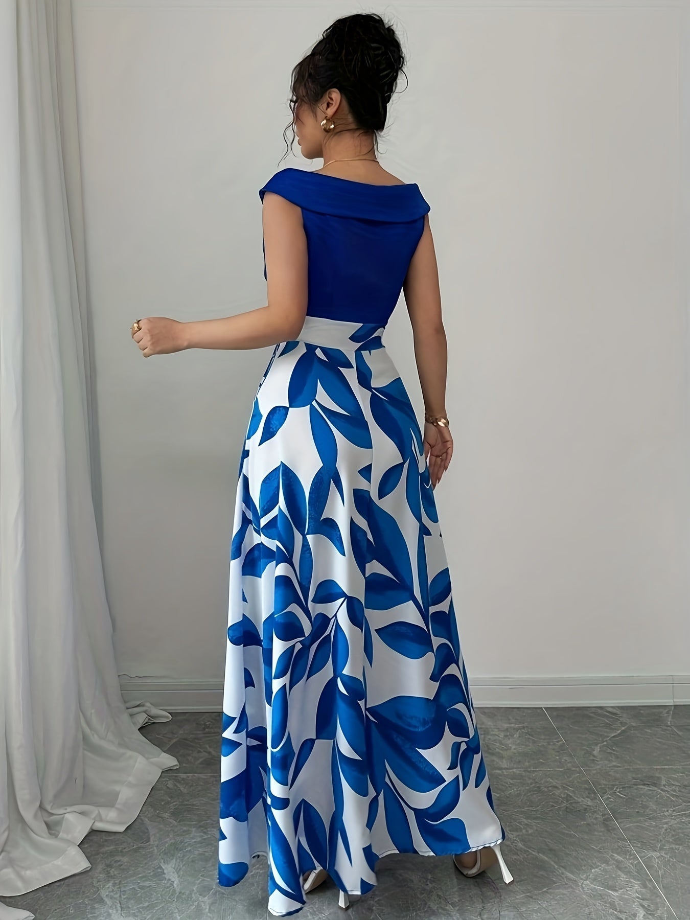 Robe longue invitée mariage imprimé feuillage taille cintrée