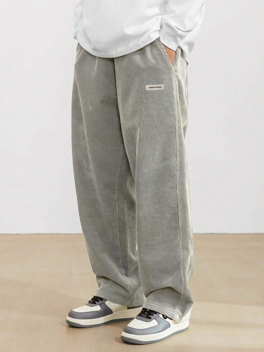 Pantalon homme en velours côtelé coupe baggy taille élastique jambes larges