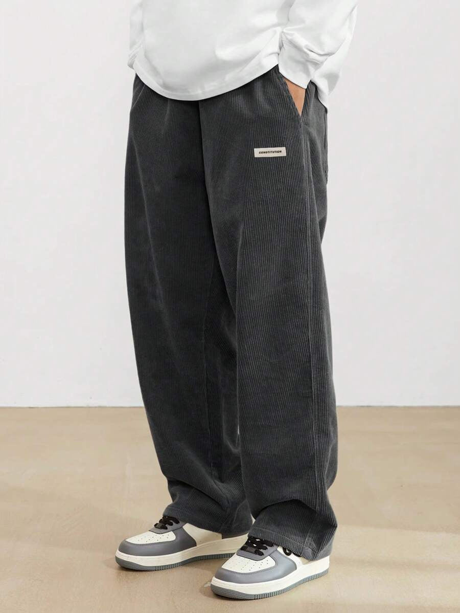 Pantalon homme en velours côtelé coupe baggy taille élastique jambes larges