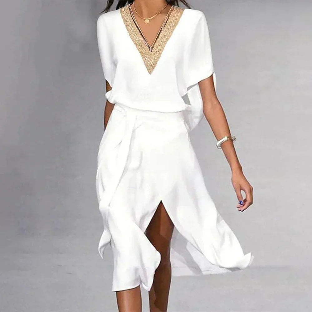 Robe midi femme col V manches courtes coupe fluide fente devant élégante