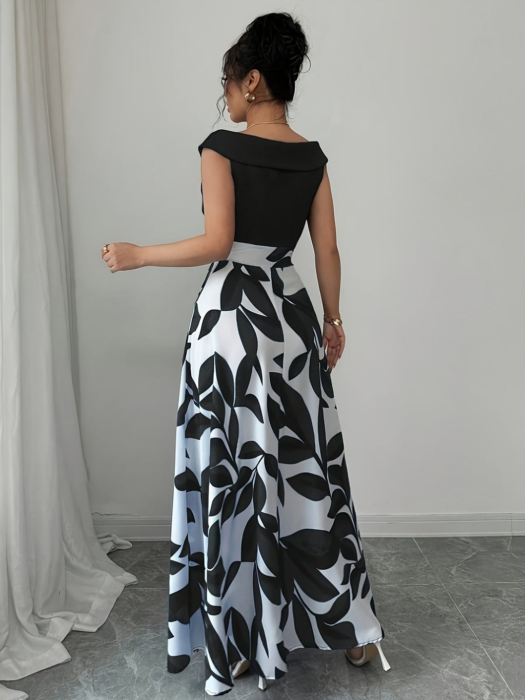 Robe longue invitée mariage imprimé feuillage taille cintrée