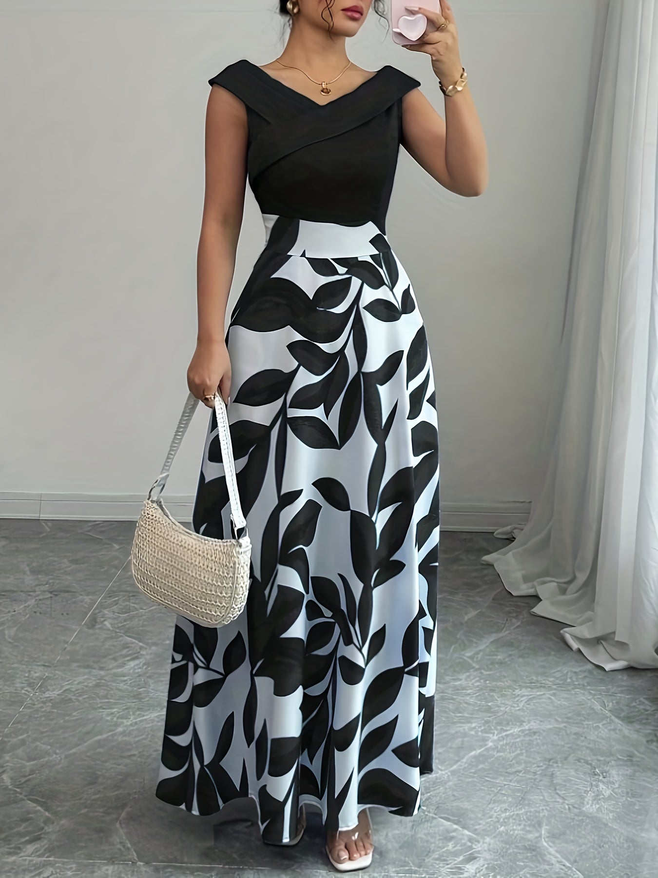 Robe longue invitée mariage imprimé feuillage taille cintrée
