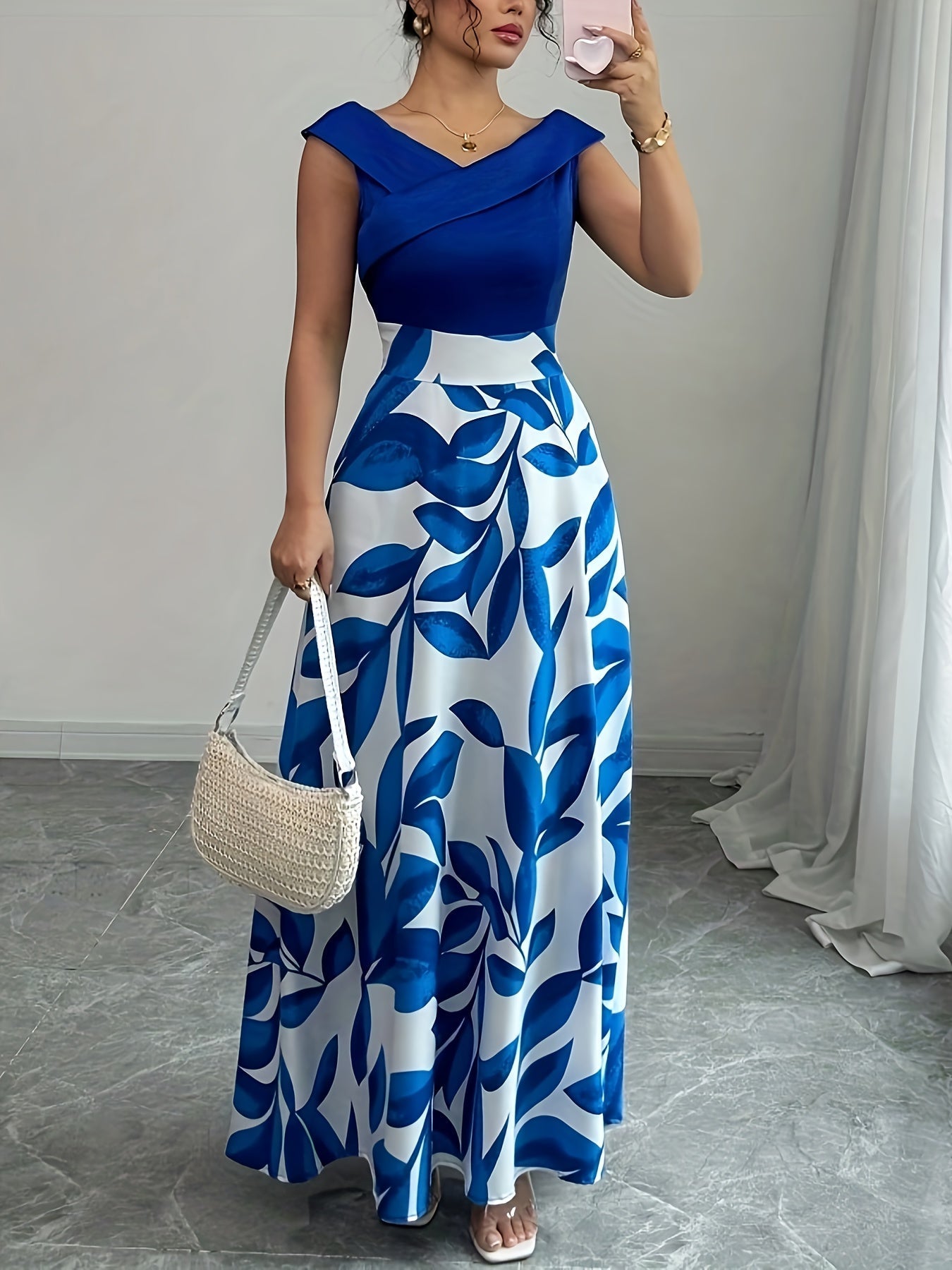 Robe longue invitée mariage imprimé feuillage taille cintrée