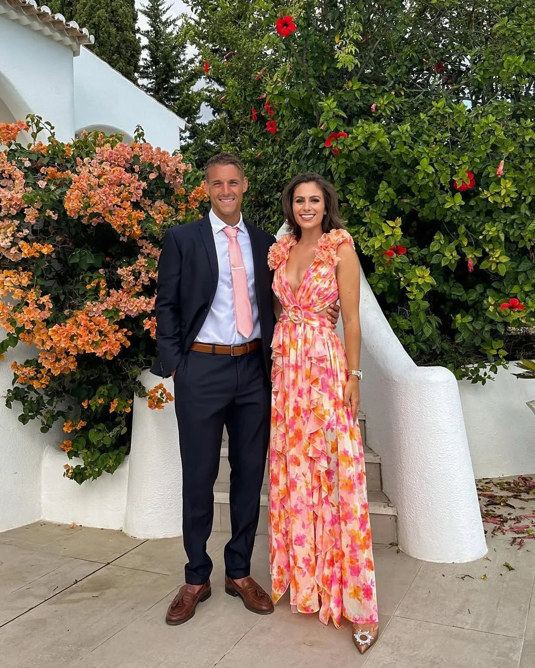 Robe longue fleurie invitée mariage col V volants