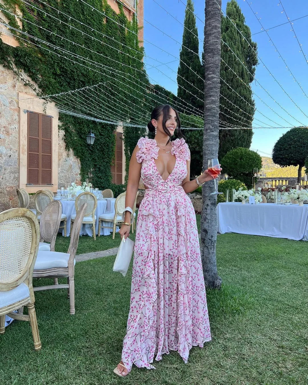 Robe longue fleurie invitée mariage col V volants