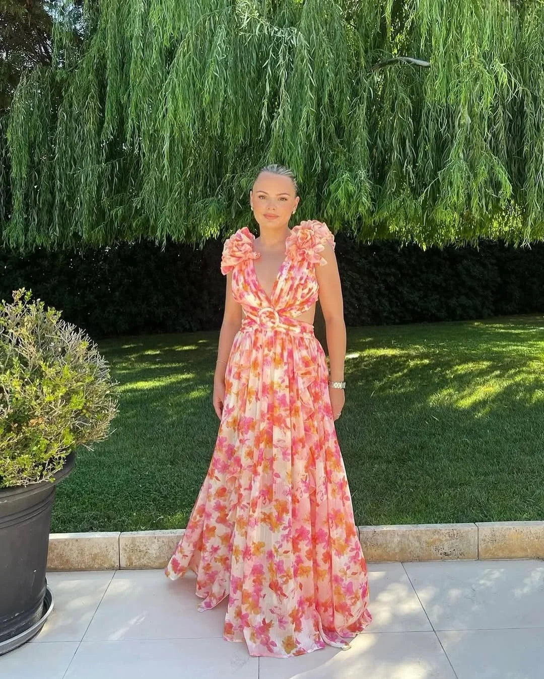 Robe longue fleurie invitée mariage col V volants