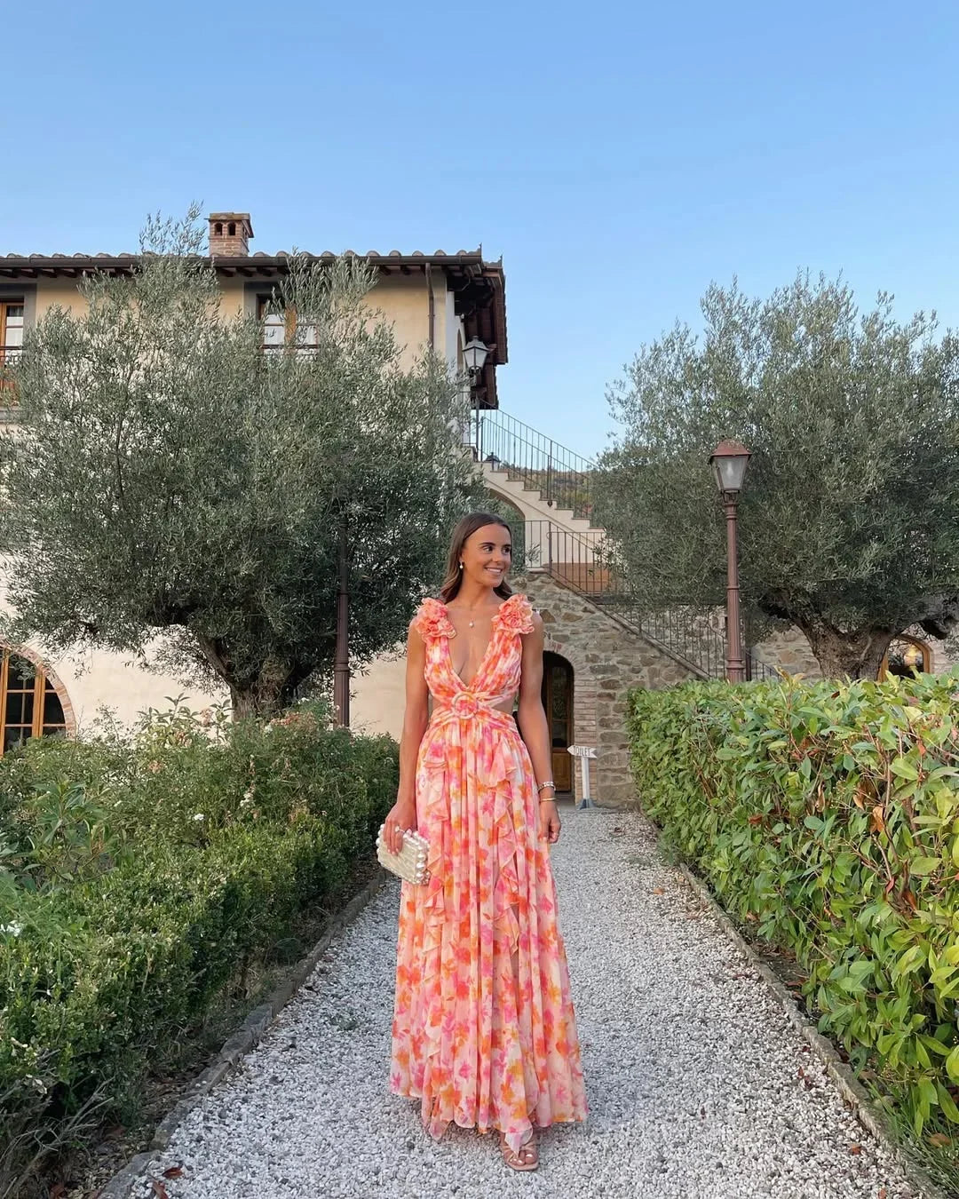 Robe longue fleurie invitée mariage col V volants